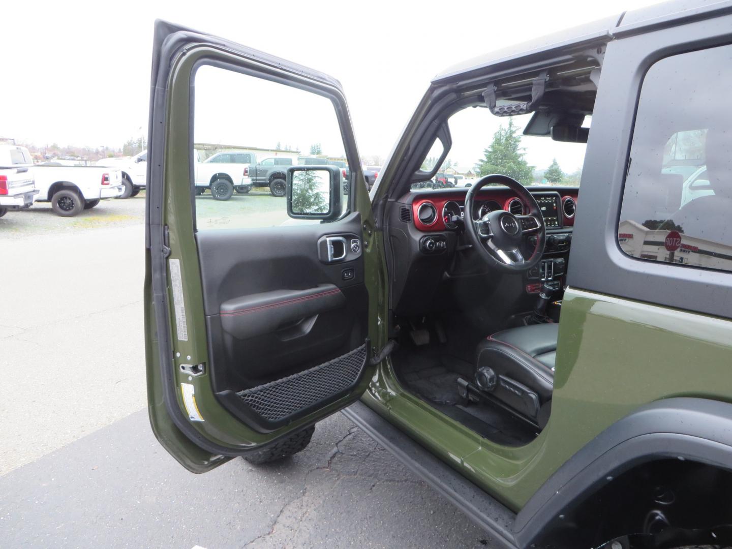 2021 Sarge Green /BLACK Jeep Wrangler Rubicon (1C4HJXCN4MW) with an 2.0L L4 DOHC 16V TURBO engine, 6A transmission, located at 2630 Grass Valley Highway, Auburn, CA, 95603, (530) 508-5100, 38.937893, -121.095482 - Rubicon featuring a Mopar suspension system, Fox shocks, 17" Fuel Wheels, BFG KO2 tires, Maxximus 3 front bumper stinger, Dual exhaust, Bolt hitch lock, Mopar HD tailgate hinge, and a custom cargo platform. - Photo#14